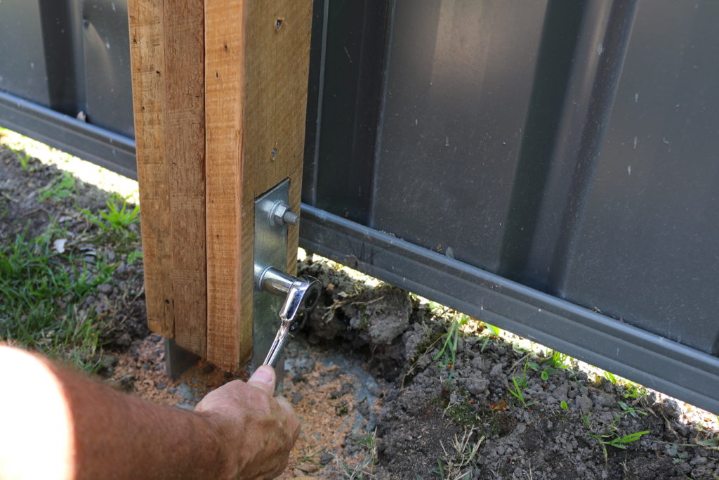 Bolting the Trellis Fence Post
